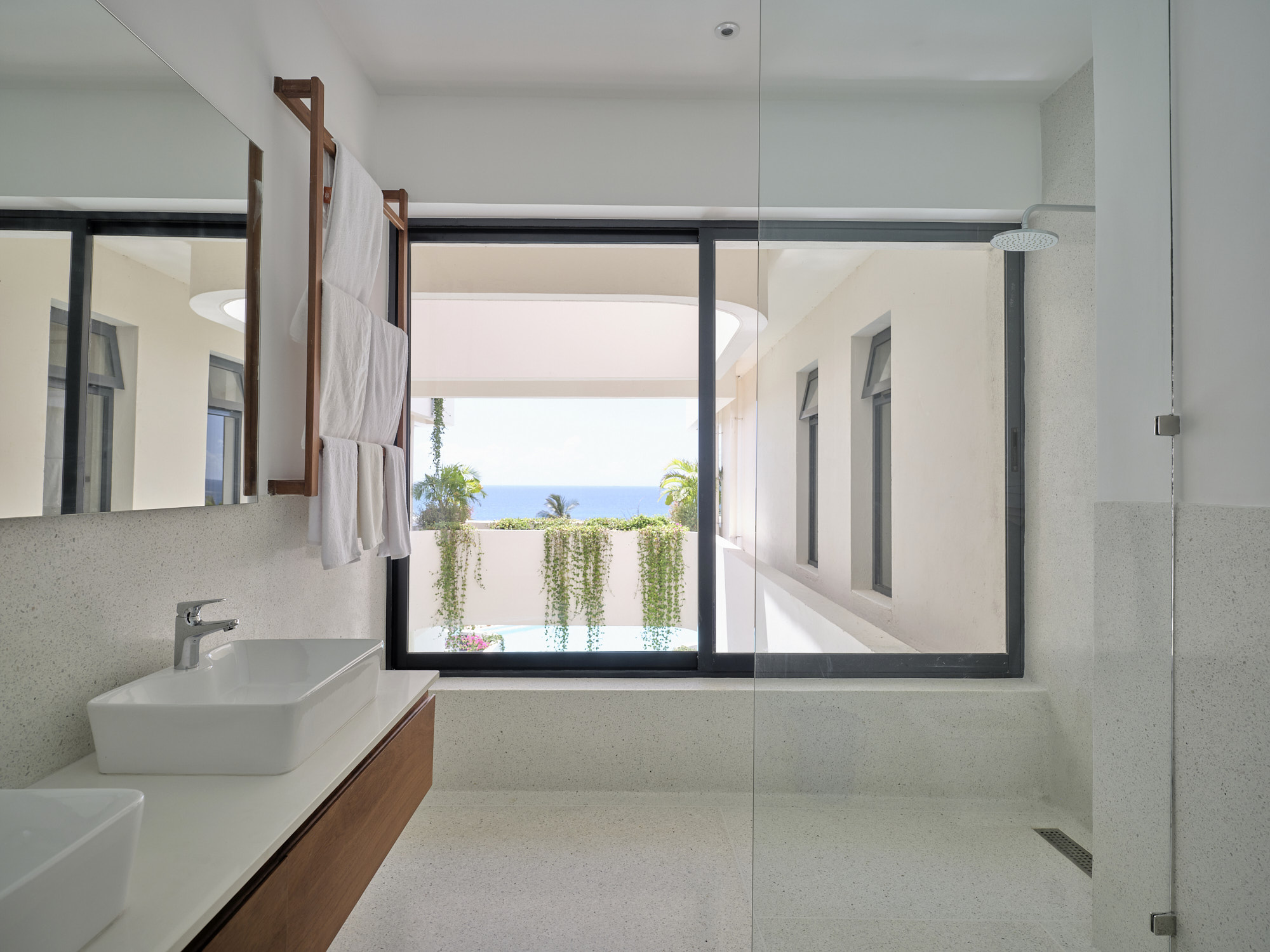 Private bathroom with ocean glimpse